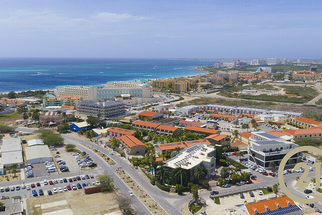 Aerial coastline view from the Sunset Residence Unit 15 listing